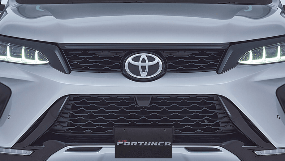 Front grille close-up of a Platinum White Pearl Toyota Fortuner Legender