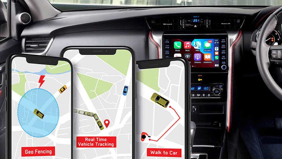 interior dashboard of a Toyota Fortuner Legender with smartphone apps displayed