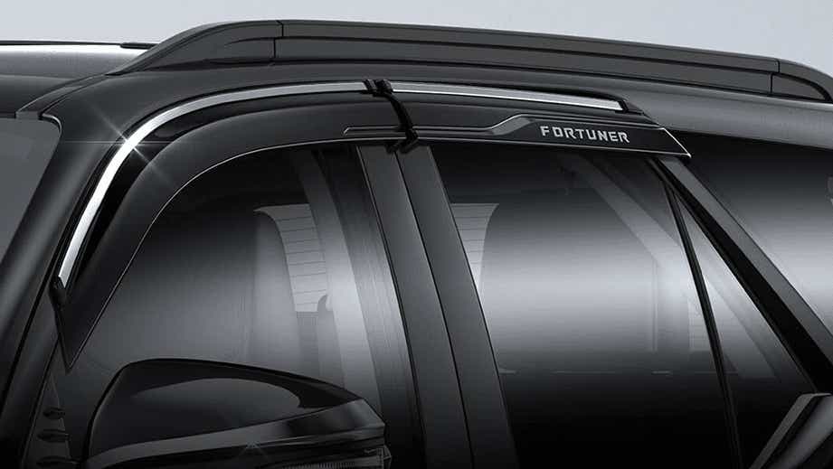 Front door visor and side mirror of a Toyota Fortuner
