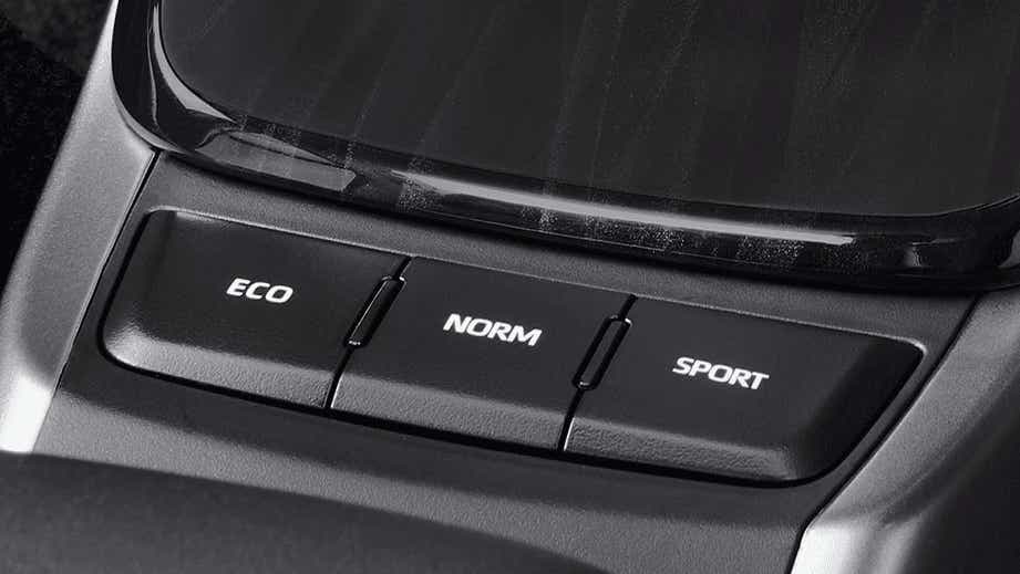 Drive mode selector buttons (ECO, NORM, SPORT) of a Toyota Fortuner