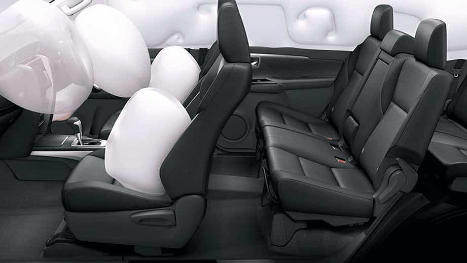 interior side view showing airbags deployed in a Toyota Fortuner