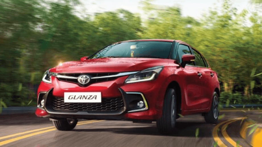 front view of a Sportin Red Toyota Glanza