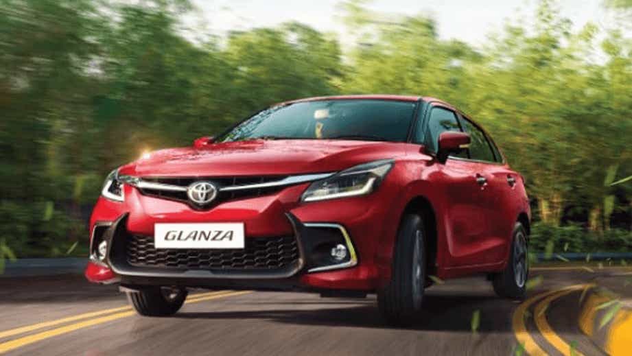 front view of a Sportin Red Toyota Glanza