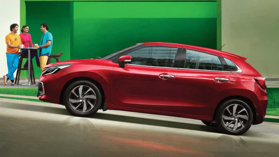 side profile of a Sportin Red Toyota Glanza