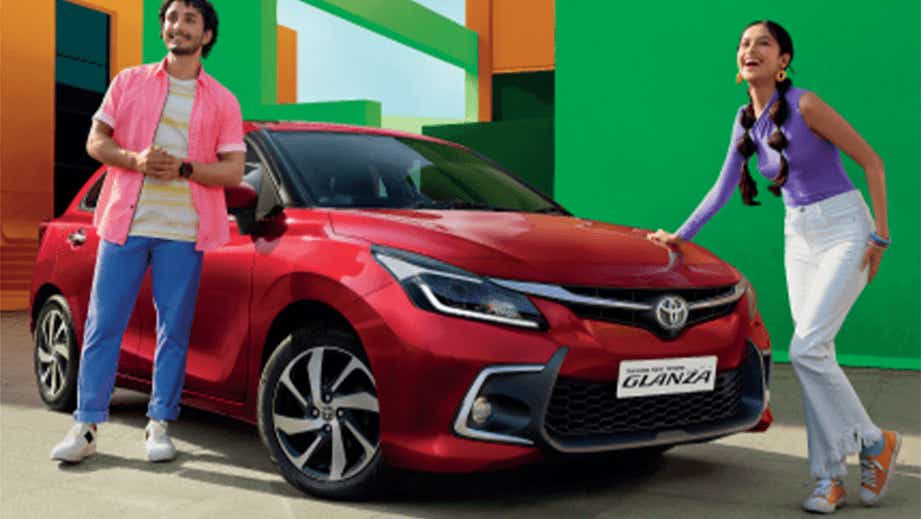 Front three-quarter view of a Sportin Red Toyota Glanza