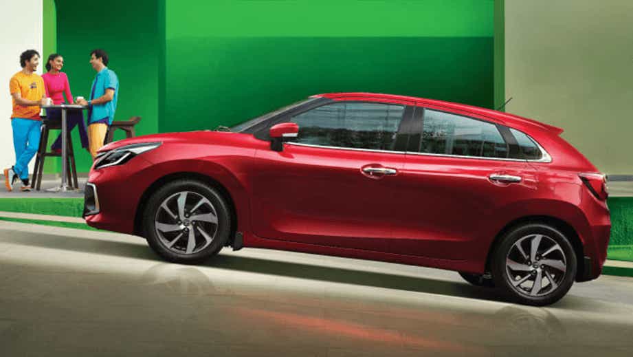 side view of a Sportin Red Toyota Glanza