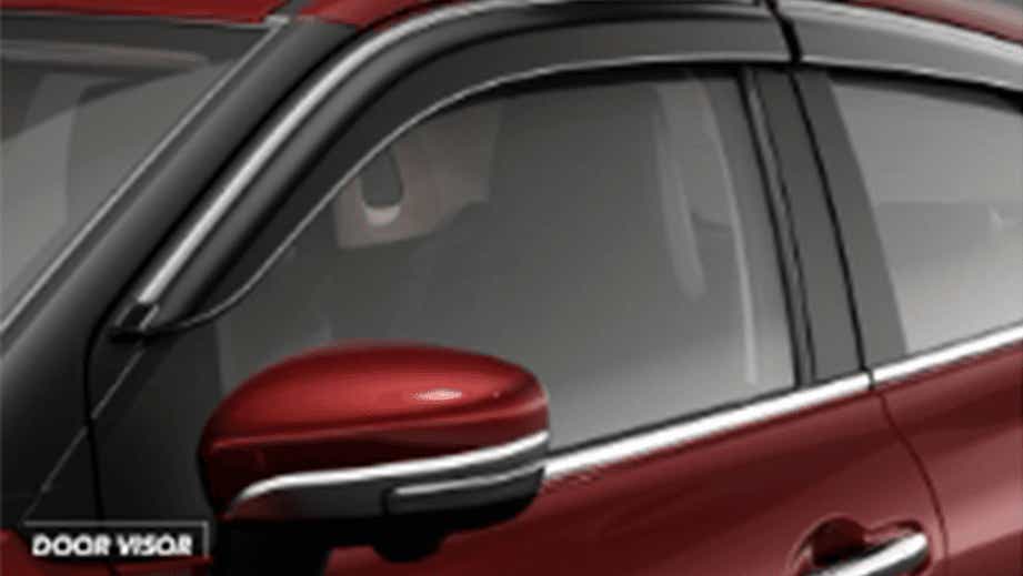 Front door visor and mirror close-up of a Toyota Glanza