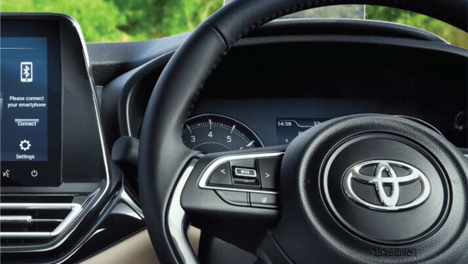interior dashboard and steering wheel of a Toyota Glanza