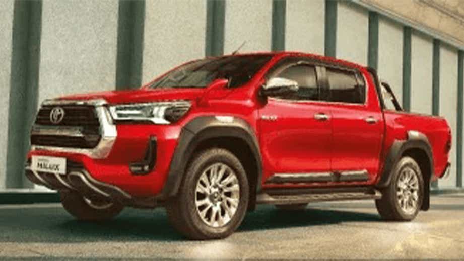 front three-quarter view of a Emotional Red Toyota Hilux