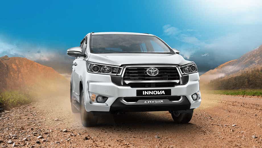front view of a Super White Toyota Innova Crysta