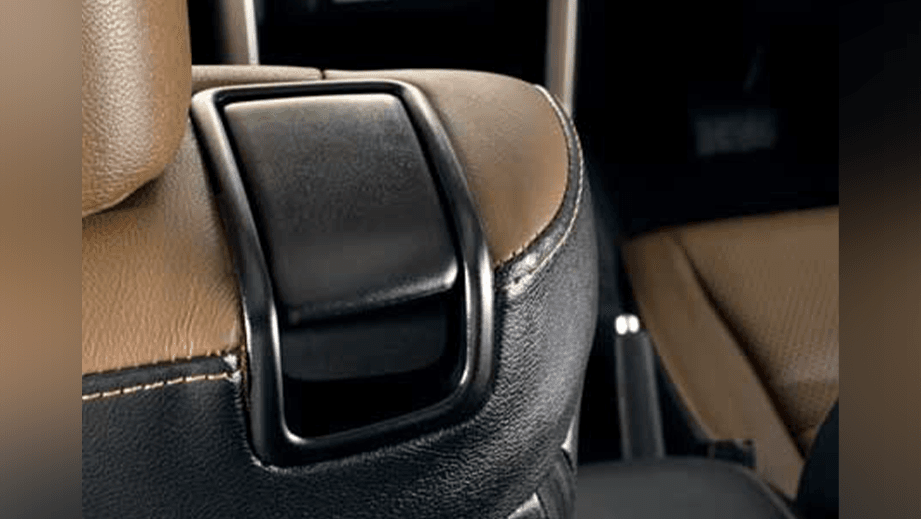 close-up of a seat belt guide on a Toyota Innova Crysta seat