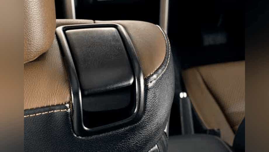 close-up of a seat belt guide on a Toyota Innova Crysta seat