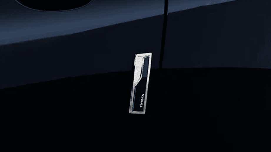 Door badge area of a Toyota Innova Hycross