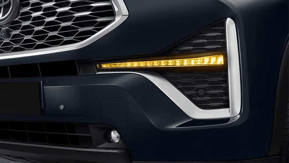 front bumper and headlight close-up of a Toyota Innova Hycross