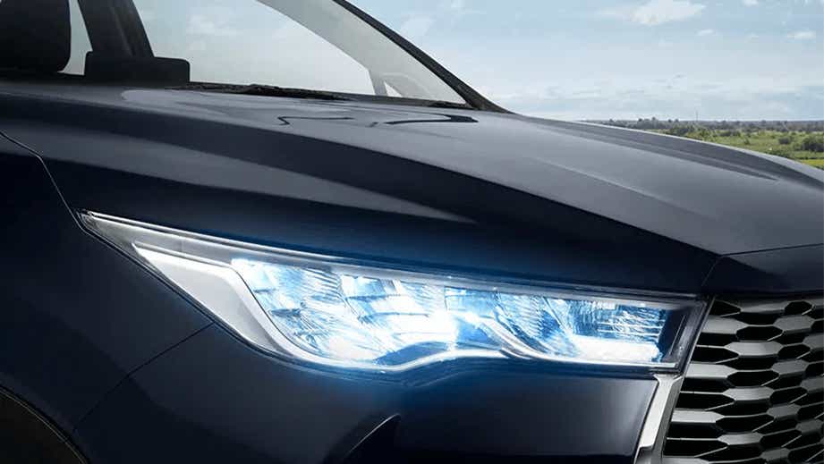 Headlight close-up of a Toyota Innova Hycross