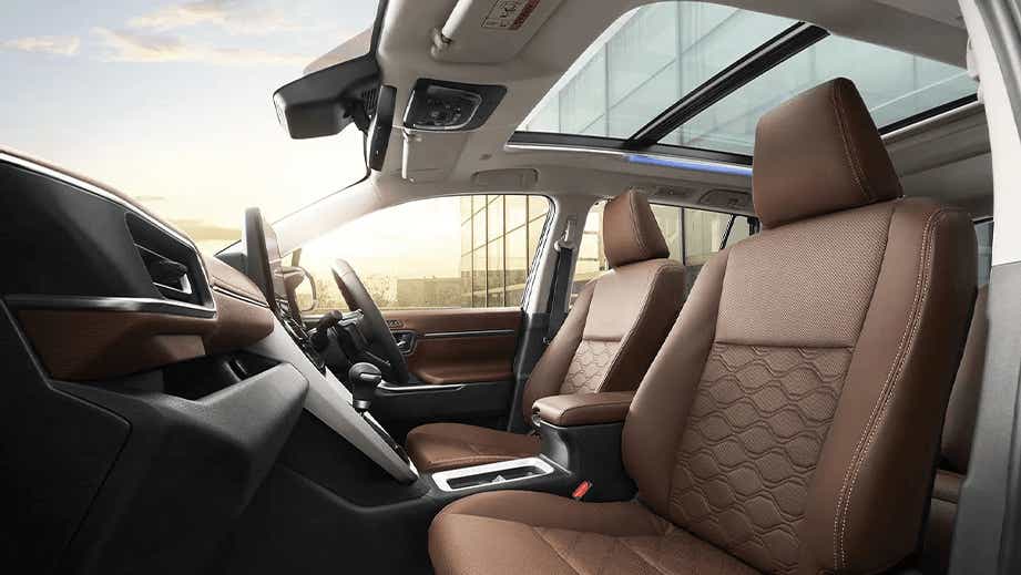 interior front seats and dashboard of a Toyota Innova Hycross