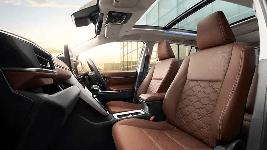 Interior dashboard and front seats of a Toyota Innova Hycross
