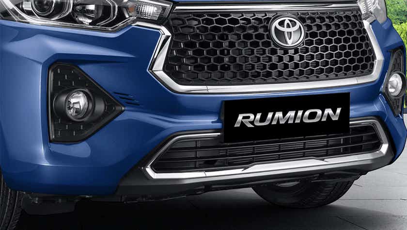 front bumper and grille of a Spunky Blue Toyota Rumion