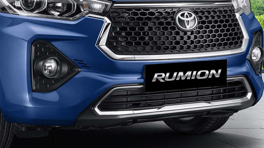 front bumper and grille of a Spunky Blue Toyota Rumion
