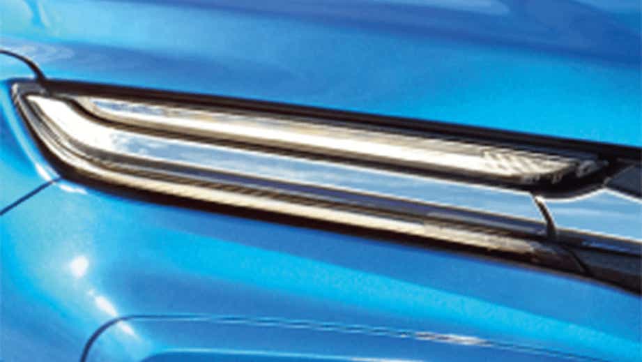 Headlight close-up of a Toyota Urban Cruiser Hyryder