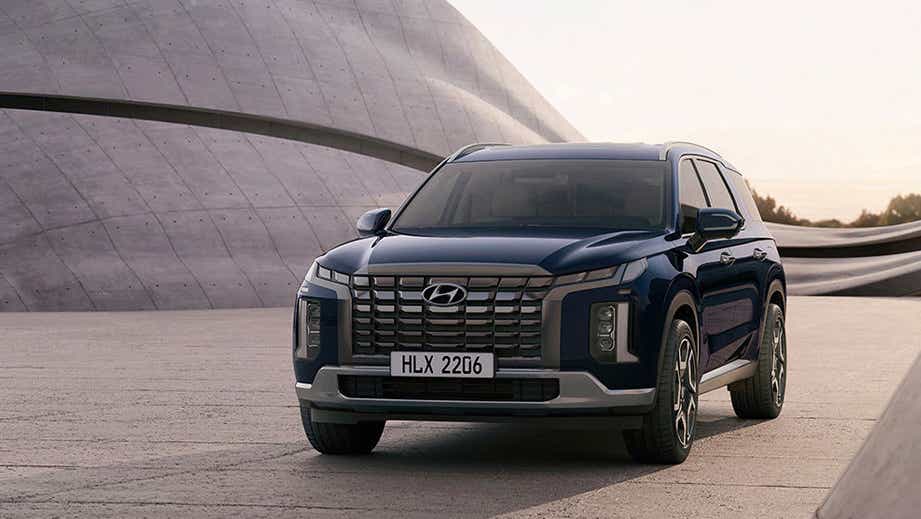 Front view of a Blue Hyundai Palisade