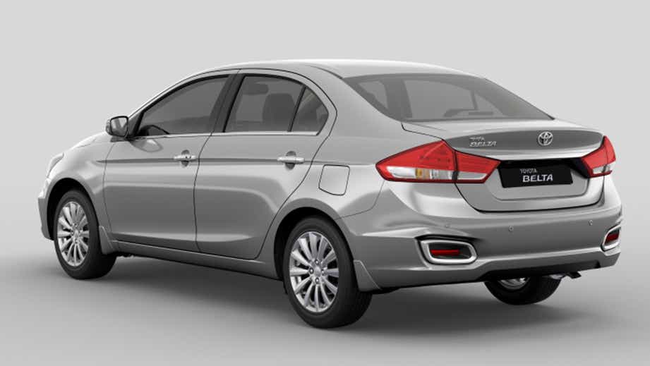 rear three-quarter of a Polar White Toyota Belta