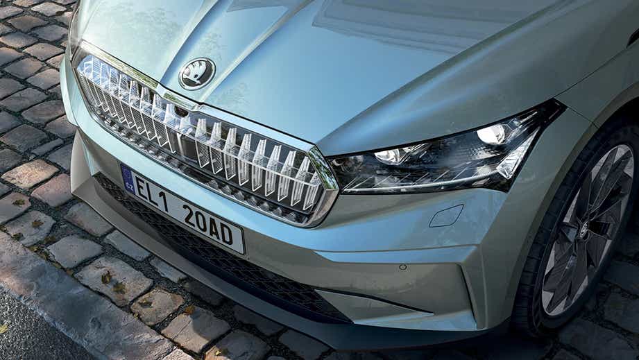 Front end close-up of a Arctic Green Skoda Enyaq