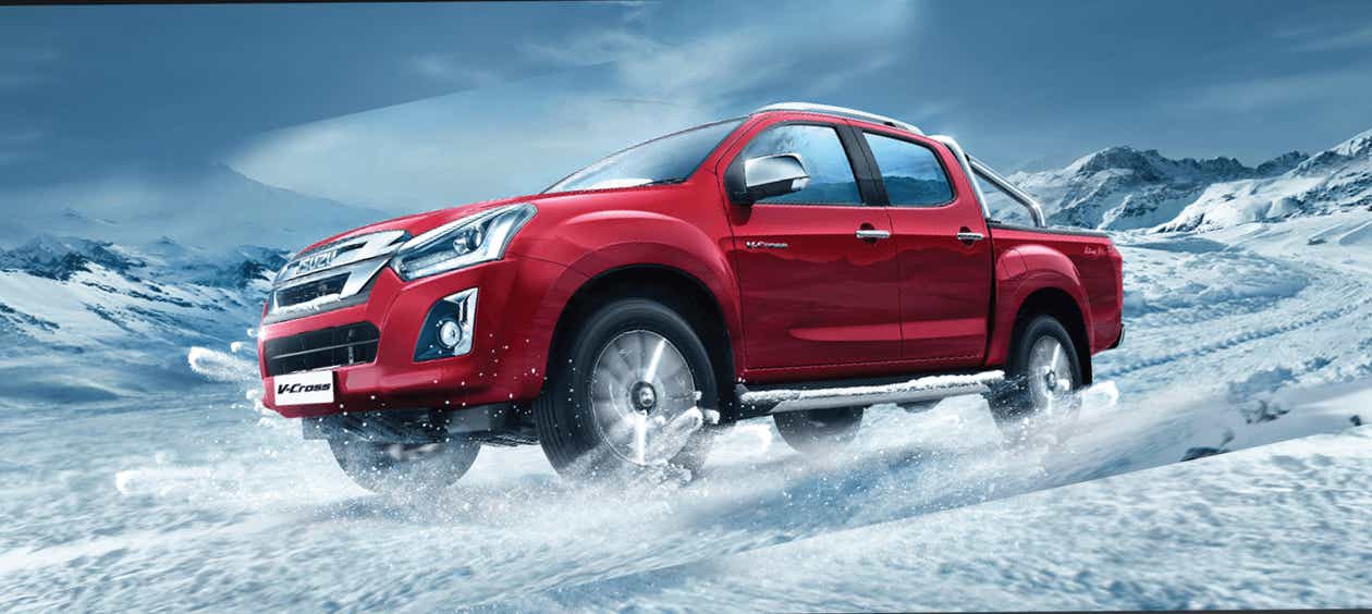 front three-quarter view of a Red Spinal Mica Isuzu V-Cross
