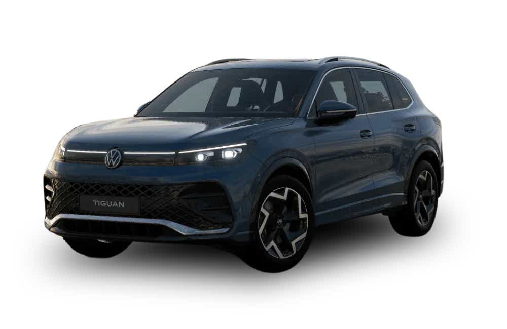 Front three-quarter view of a Nightshade Blue Metallic Volkswagen Tiguan