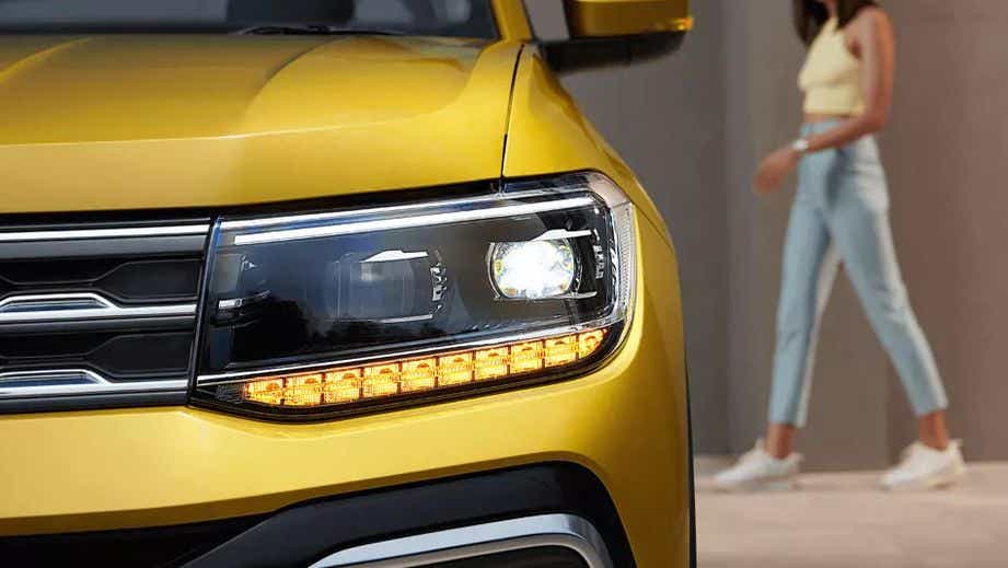 Headlight close-up of a Volkswagen Taigun