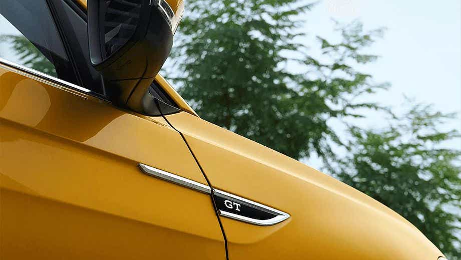 Close-up of side fender and mirror on a Volkswagen Taigun GT