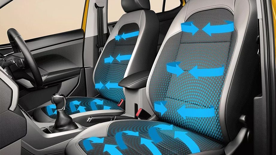 Front seats and interior dashboard of a Volkswagen Taigun