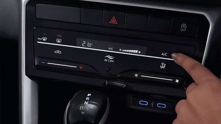 Dashboard climate control panel of a Volkswagen Taigun