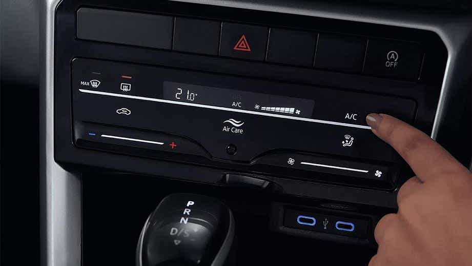 Dashboard climate control panel of a Volkswagen Taigun