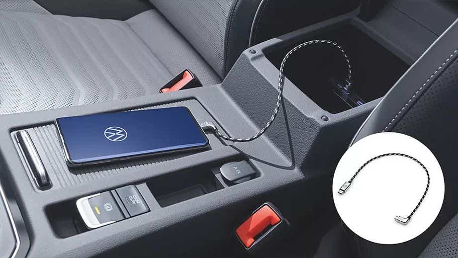center console with smartphone charging in a Volkswagen Tiguan 2021-2024
