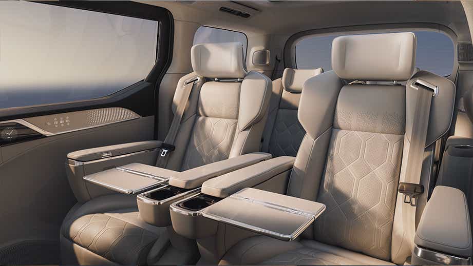 luxury rear seats and folding tables of a Volvo EM90