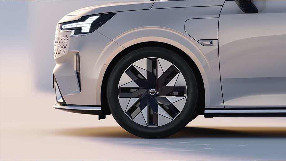 Front wheel and headlight close-up of a Volvo EM90