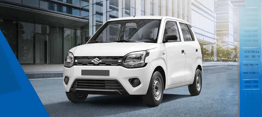 front three-quarter of a Solid White Maruti Suzuki Wagon R tour