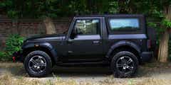 side profile of a Napoli Black Mahindra Thar