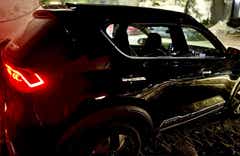 rear and side view of a Kia Sonet