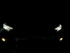 Front headlight close-up of a Kia Sonet