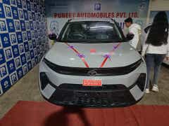 Front view of a Tata Nexon at a dealership
