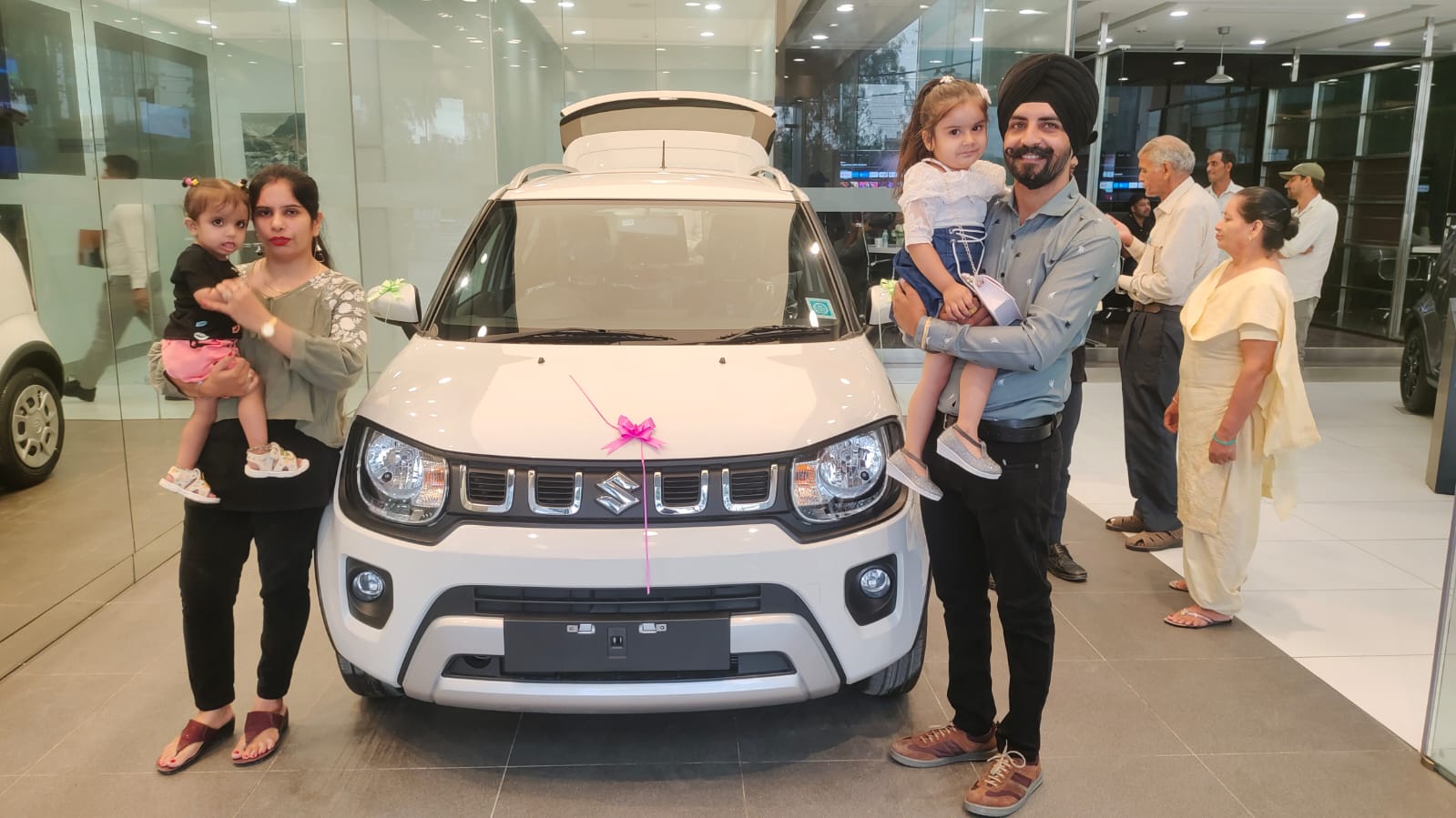Front view of a Maruti Suzuki Ignis at a dealership