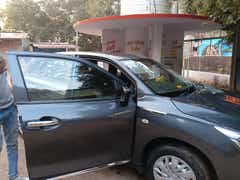 front left side view of a Maruti Suzuki Baleno