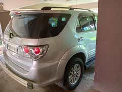 rear three-quarter view of a Toyota Fortuner
