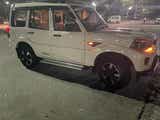 side view of a Everest White Mahindra Scorpio Classic