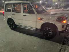 side view of a Everest White Mahindra Scorpio Classic