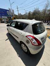 Rear three-quarter view of a Maruti Suzuki Swift