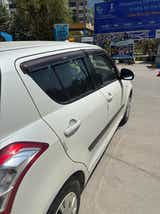 side view of a Maruti Suzuki Swift