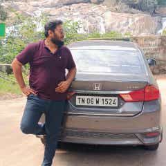 Rear view of a Honda City Hybrid parked outdoors